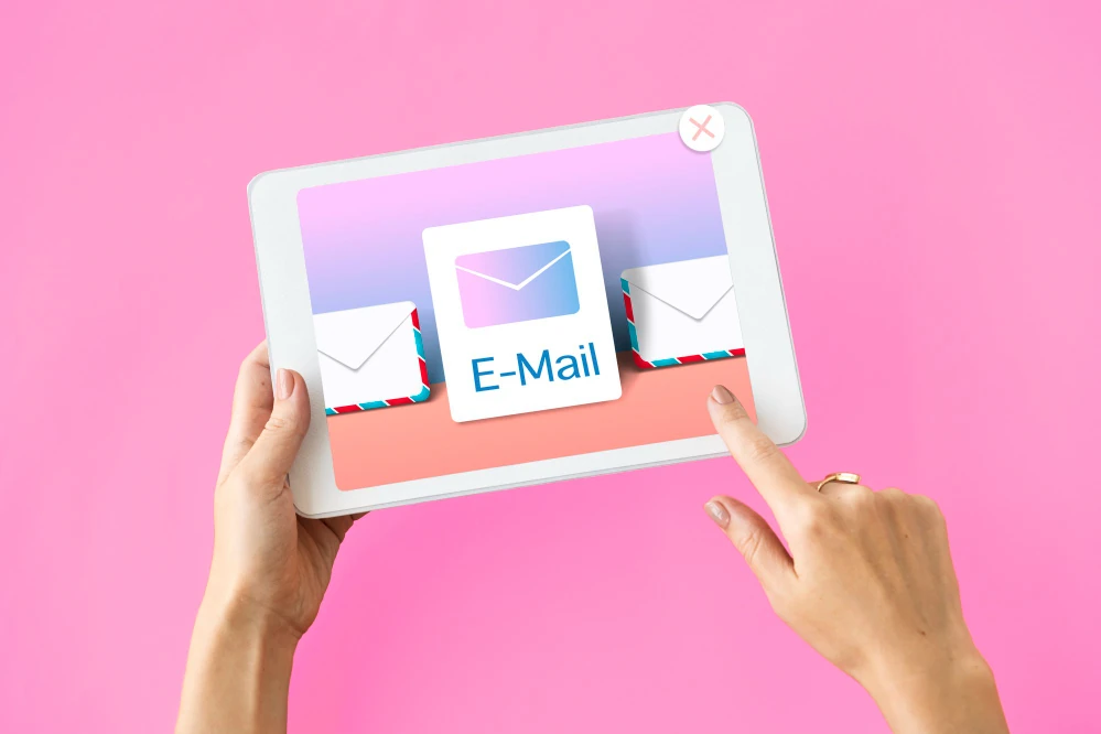 Tablet displaying email marketing icons, illustrating targeted campaign strategies.